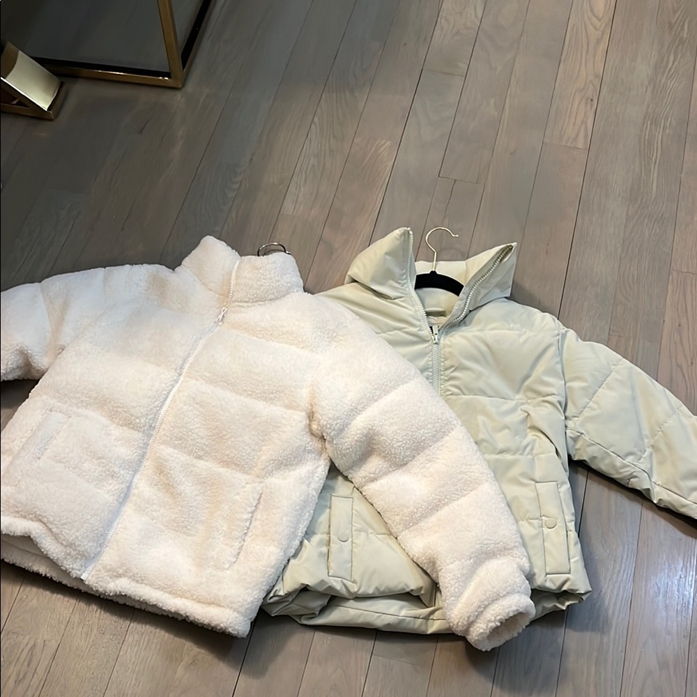 Two teen girls art class puffer coat jackets